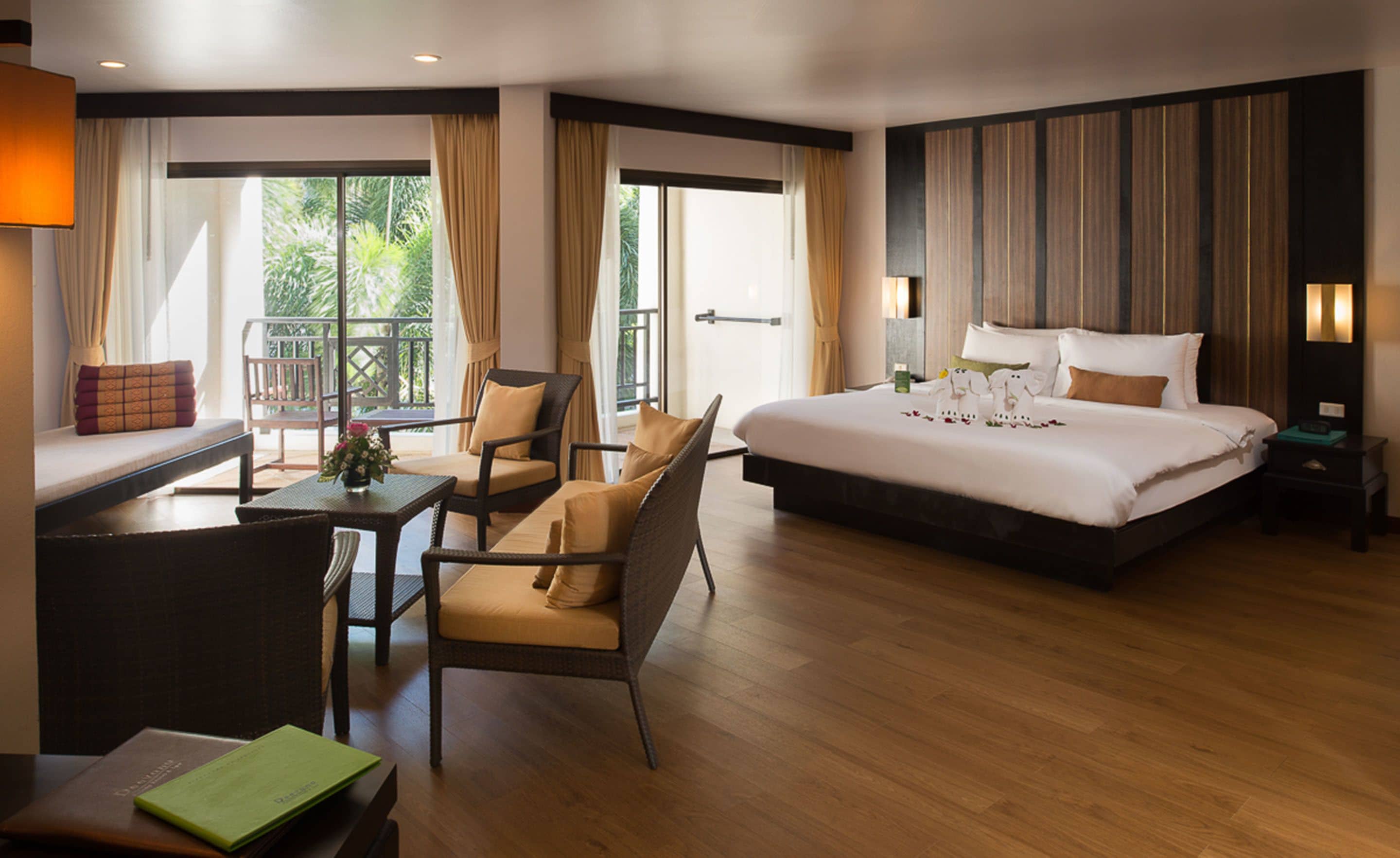 junior suite | 1 bedroom, in-room safe, desk, laptop workspace