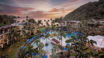 3 outdoor pools, open 8:00 AM to 9:00 PM, pool umbrellas, pool loungers