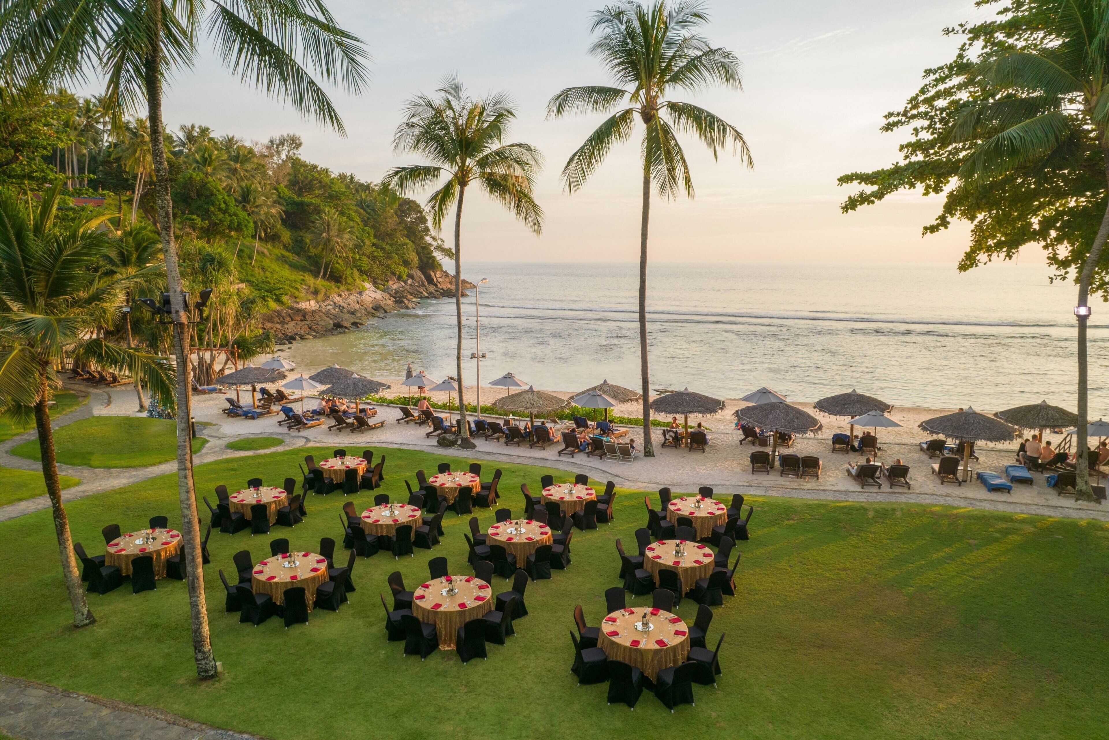 On the beach, white sand, beach umbrellas, beach towels