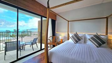 Deluxe Corner (Garden or Ocean View) | Minibar, in-room safe, free WiFi, bed sheets