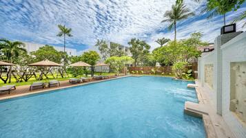 2 outdoor pools, open 7:00 AM to 7:00 PM, pool umbrellas, pool loungers