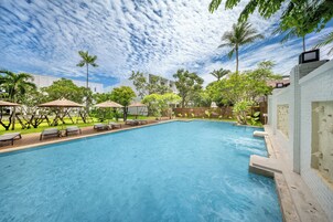 2 outdoor pools, open 7:00 AM to 7:00 PM, pool umbrellas, sun loungers