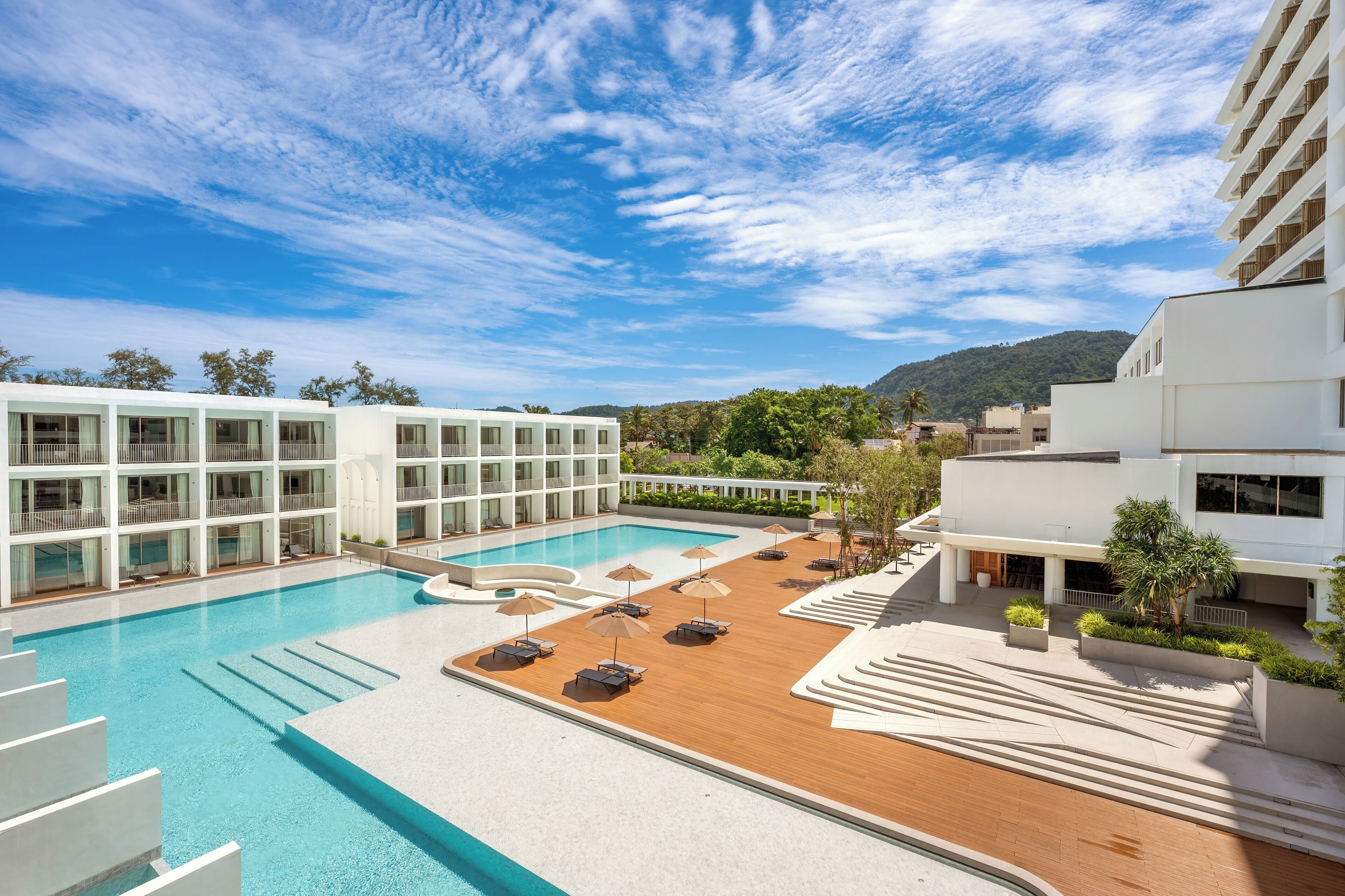 2 outdoor pools, open 7:00 AM to 7:00 PM, pool umbrellas, pool loungers