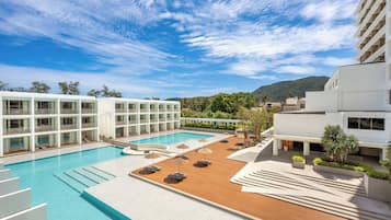 2 outdoor pools, open 7:00 AM to 7:00 PM, pool umbrellas, pool loungers