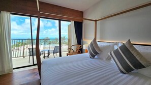 Deluxe kamer | Een minibar, een kluis op de kamer, gratis wifi, beddengoed