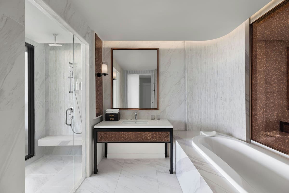 presidential suite, 1 double bed, city view | bathroom | shower, free toiletries, hair dryer, bathrobes