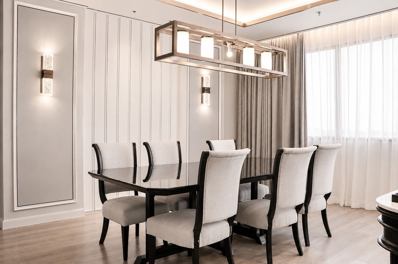 A dining area with a rectangular table and six chairs, a modern pendant light fixture, and a large window with curtains.