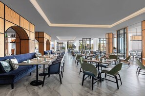 4 restaurants, breakfast, lunch served; local and international cuisine