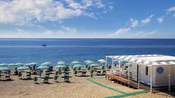 Private beach nearby, white sand, beach shuttle, sun loungers