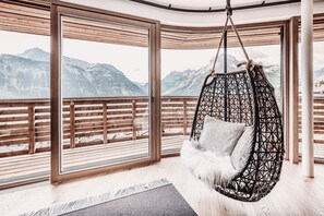 Panoramic Loft | Living area | Flat-screen TV