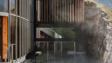 Indoor pool, outdoor pool, pool umbrellas, pool loungers