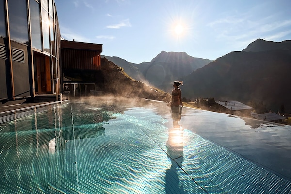 Indoor pool, outdoor pool, pool umbrellas, sun loungers