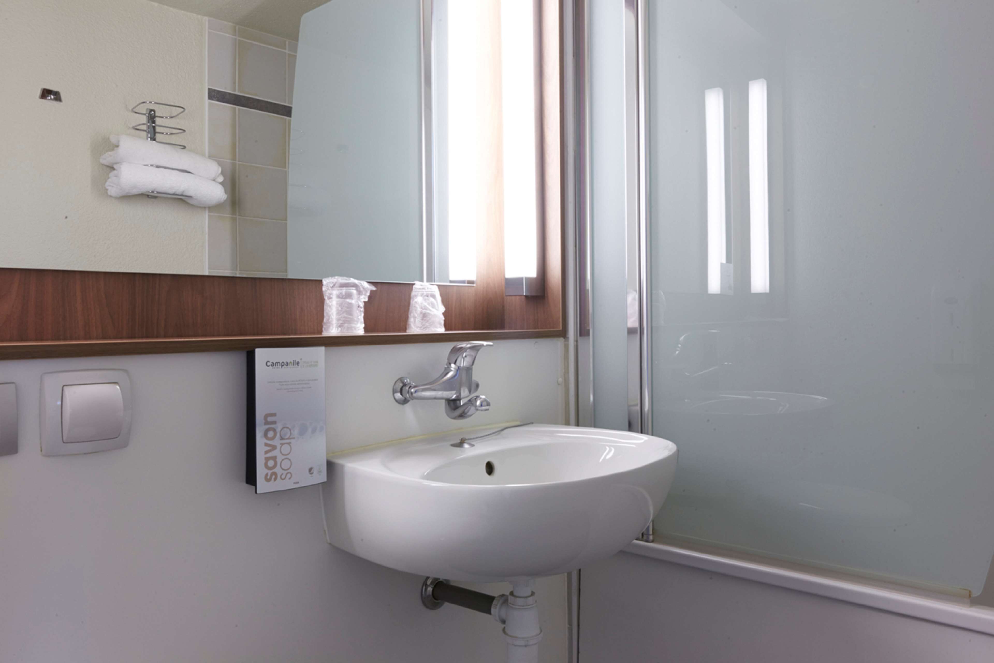 eco-friendly toiletries, towels, soap, shampoo