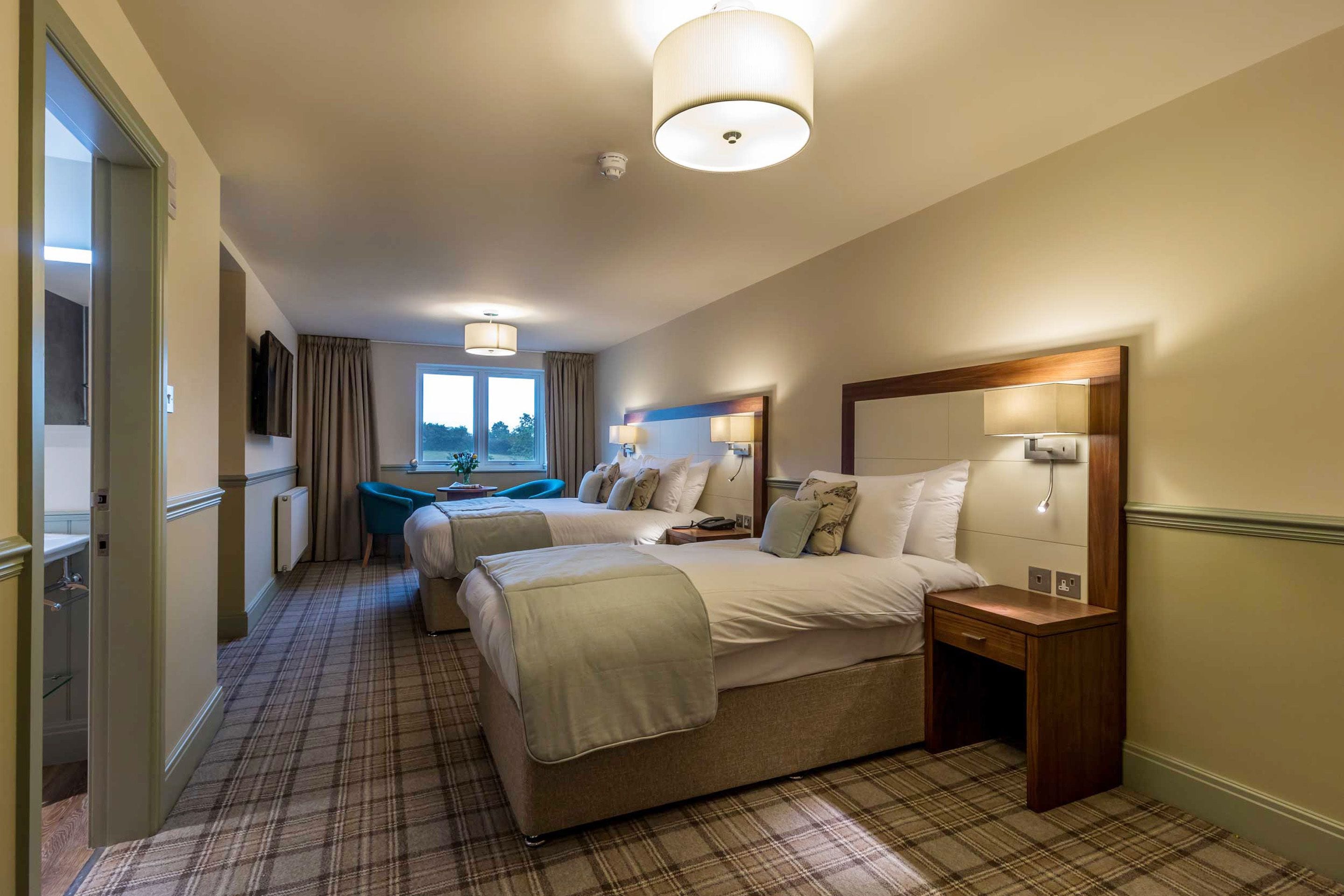 superior family room | 1 bedroom, individually decorated, desk, iron/ironing board