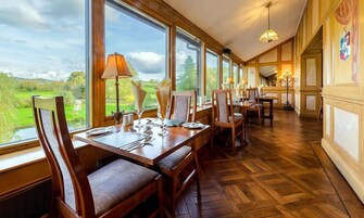 Breakfast, dinner served; British cuisine, garden views 