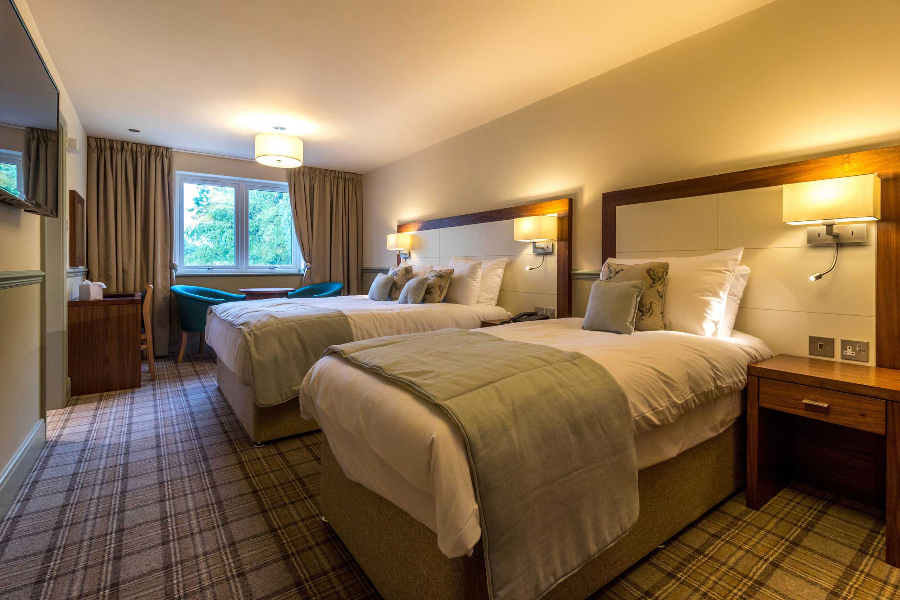 superior family room | 1 bedroom, individually decorated, desk, iron/ironing board