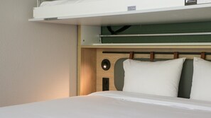 Premium bedding, desk, laptop workspace, blackout curtains
