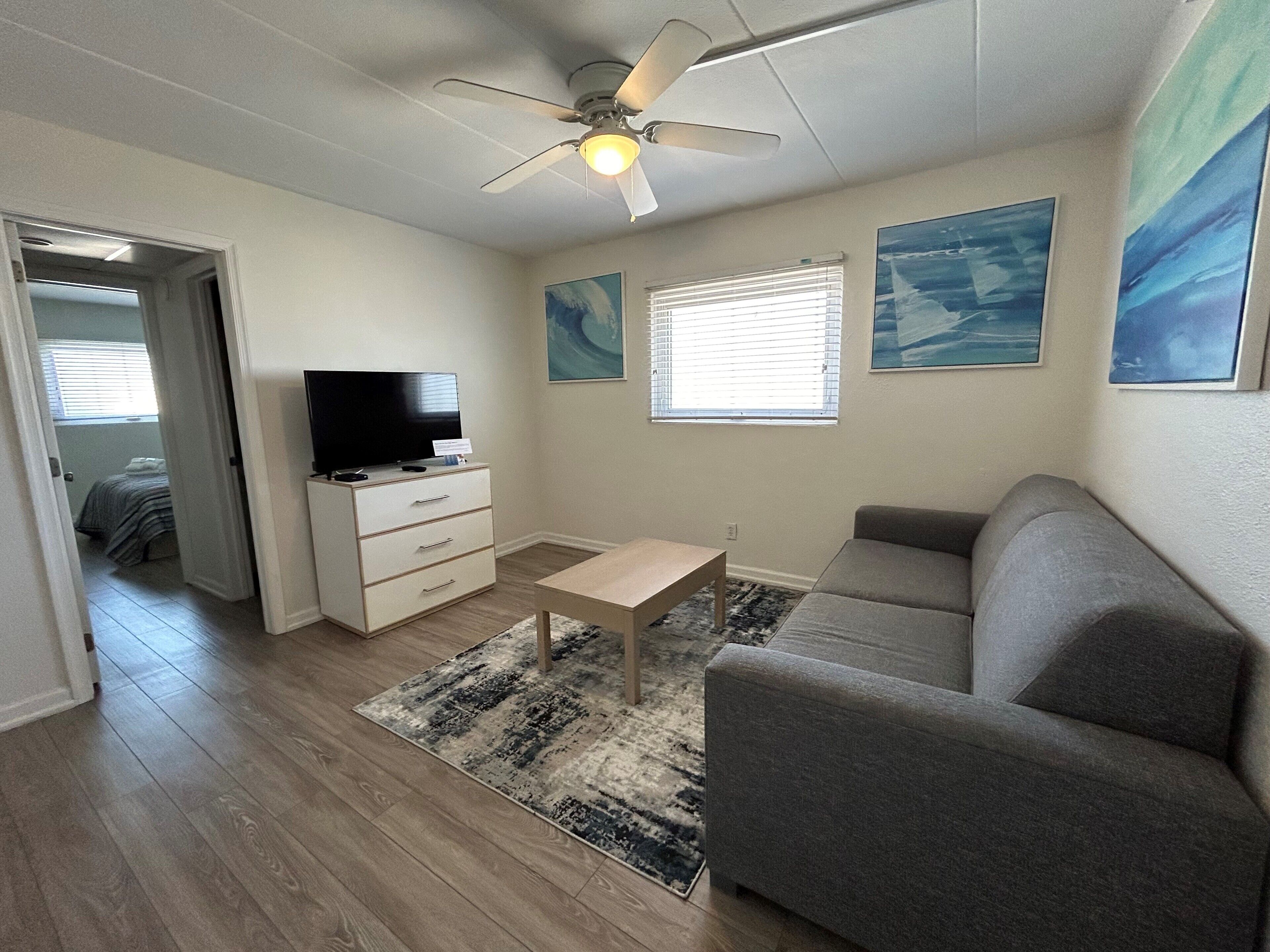 family suite | living area | 40-inch flat-screen tv with cable channels, tv