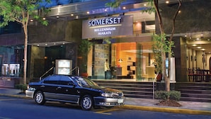 A hotel entrance with a sign reading "Somerset Millennium Makati." - Somerset Millennium Makati (Makati)