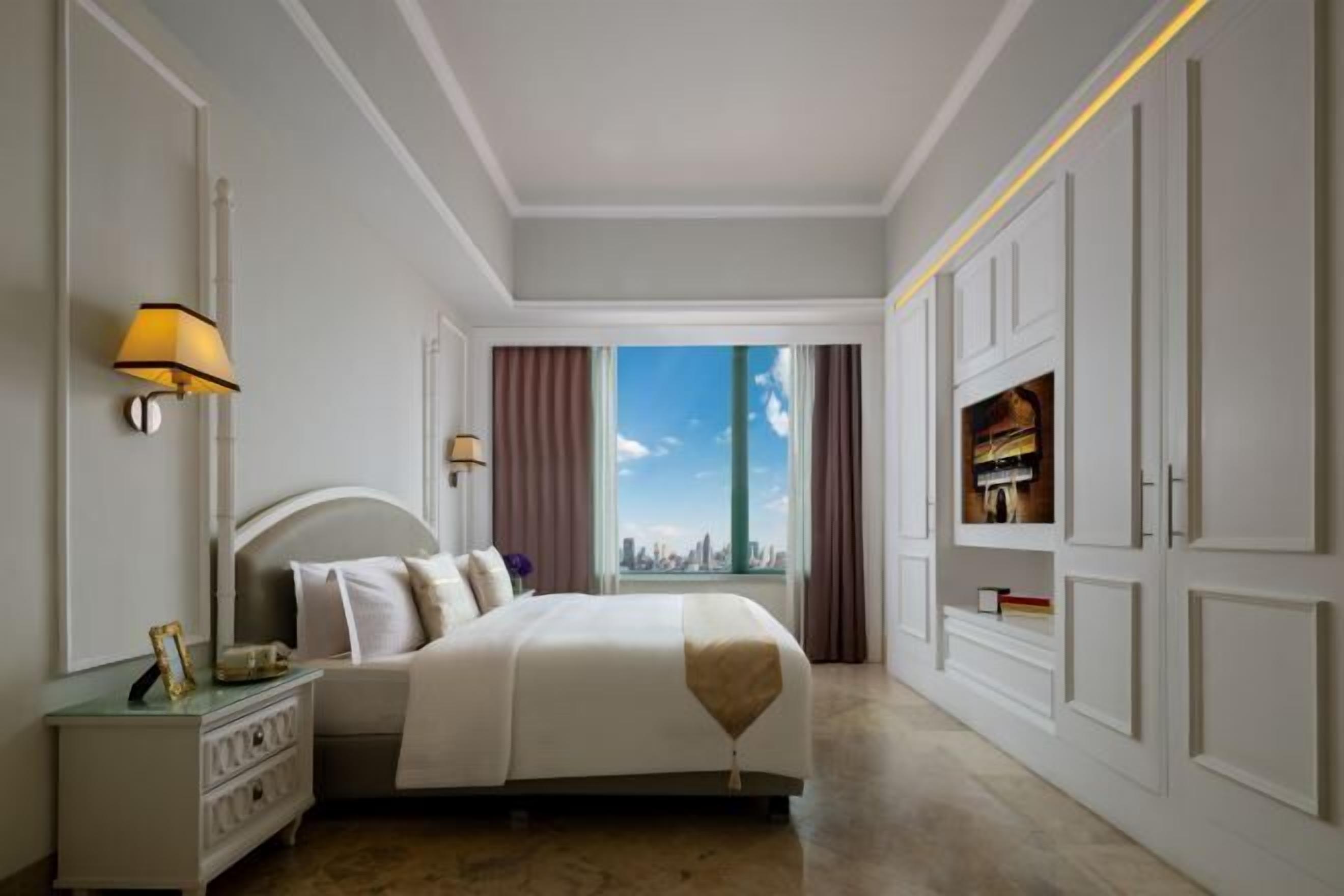 Luxe beddengoed, een kluis op de kamer, een bureau