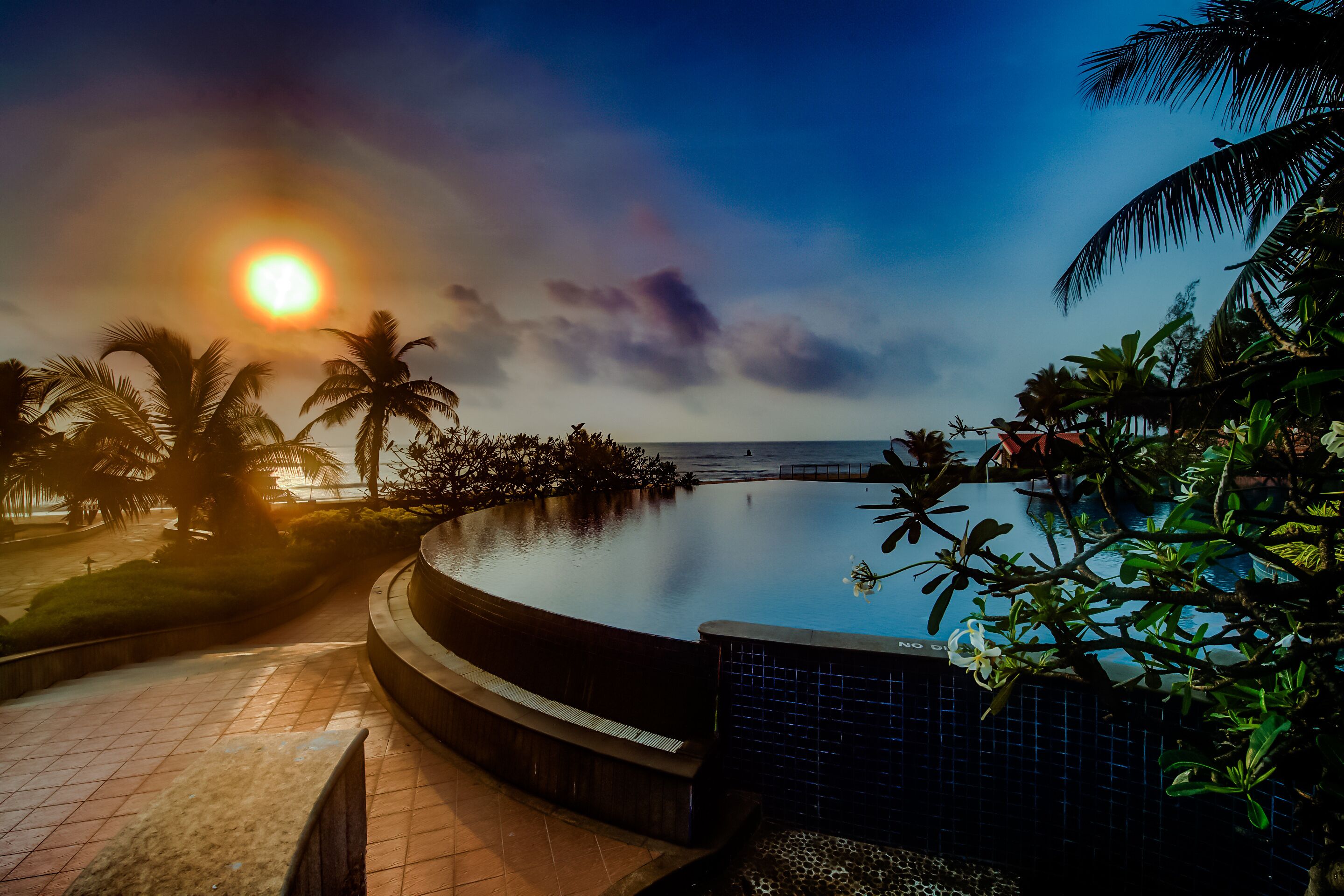 outdoor pool, pool umbrellas, pool loungers