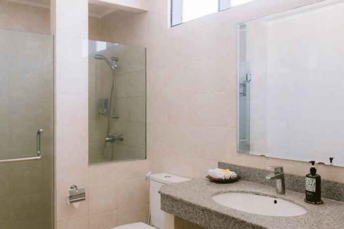 Hair dryer, slippers, towels, soap