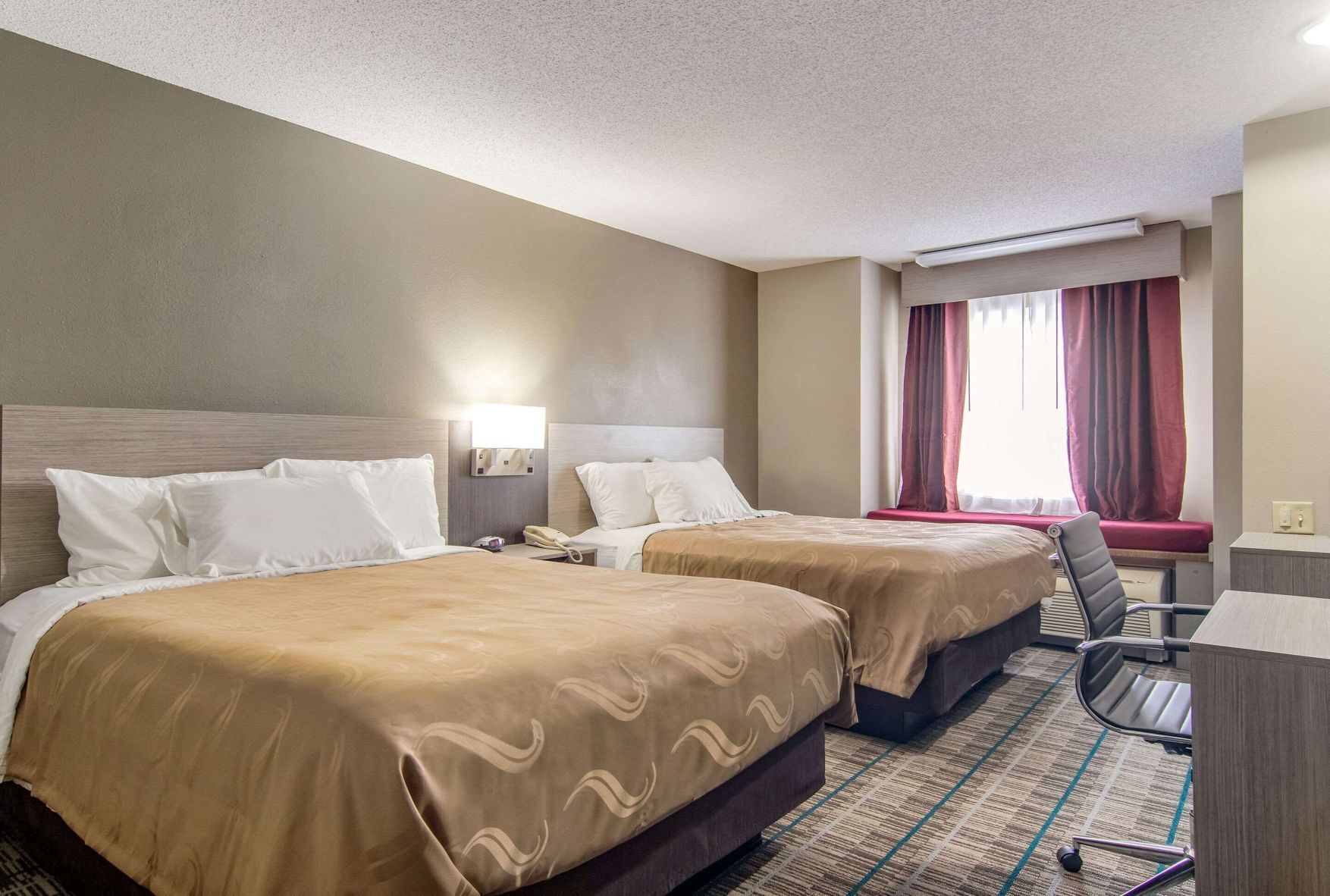 Pillowtop beds, desk, blackout drapes, soundproofing