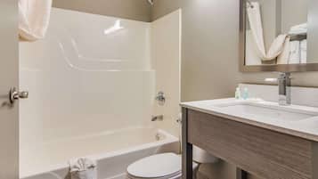Combined shower/bathtub, hair dryer, towels, soap