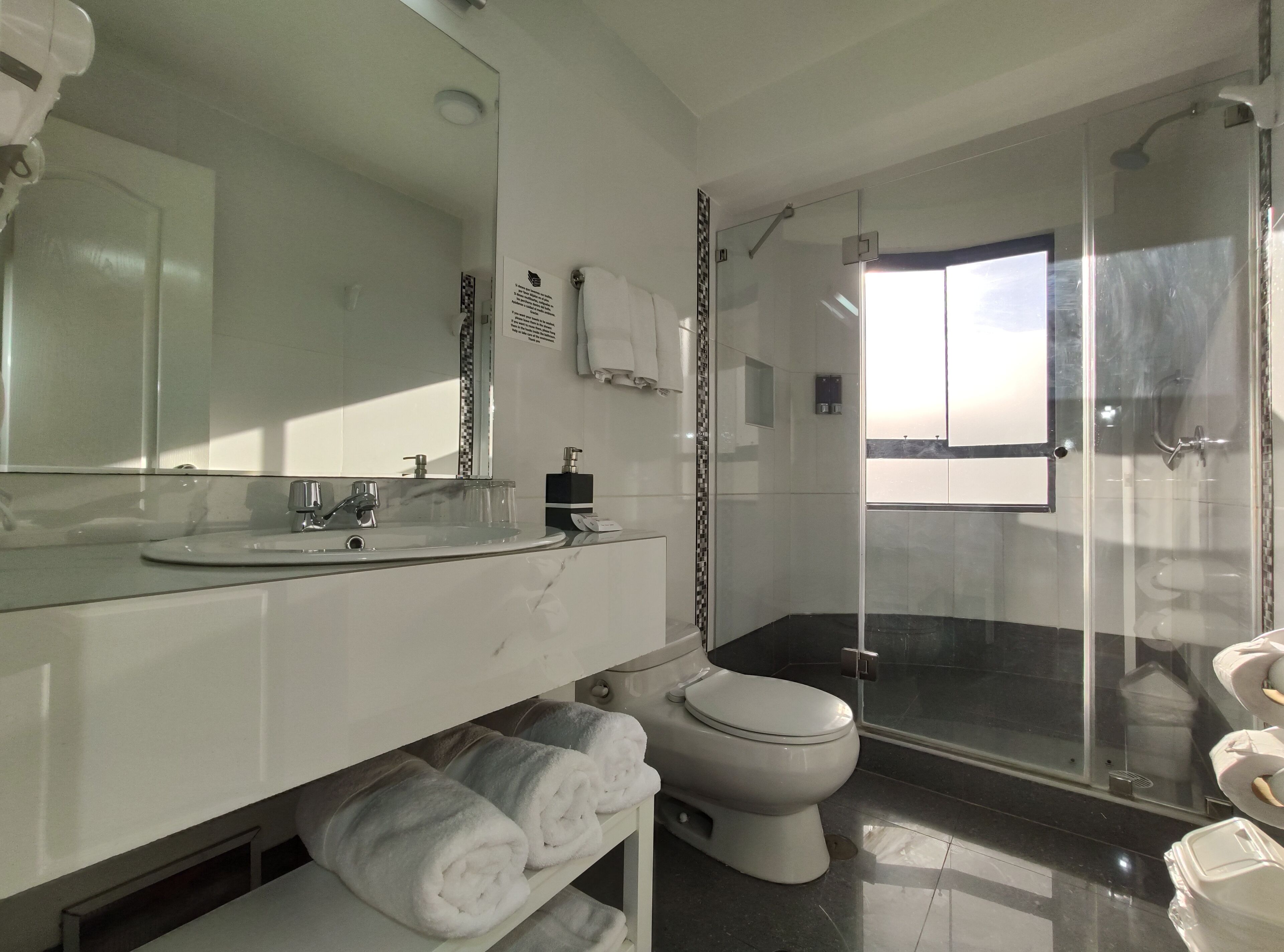 family room | bathroom | separate bathtub and shower, rainfall showerhead, free toiletries
