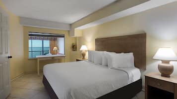 Oceanfront King Executive Suite | In-room safe, laptop workspace, blackout curtains, iron/ironing board