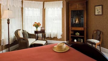 Suite, 1 Queen Bed (Jacuzzi and Fireplace) | Iron/ironing board, WiFi (free), individually decorated, bed sheets