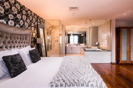 Suite X11 | Premium bedding, minibar, in-room safe, individually decorated. The Twelve Hotel