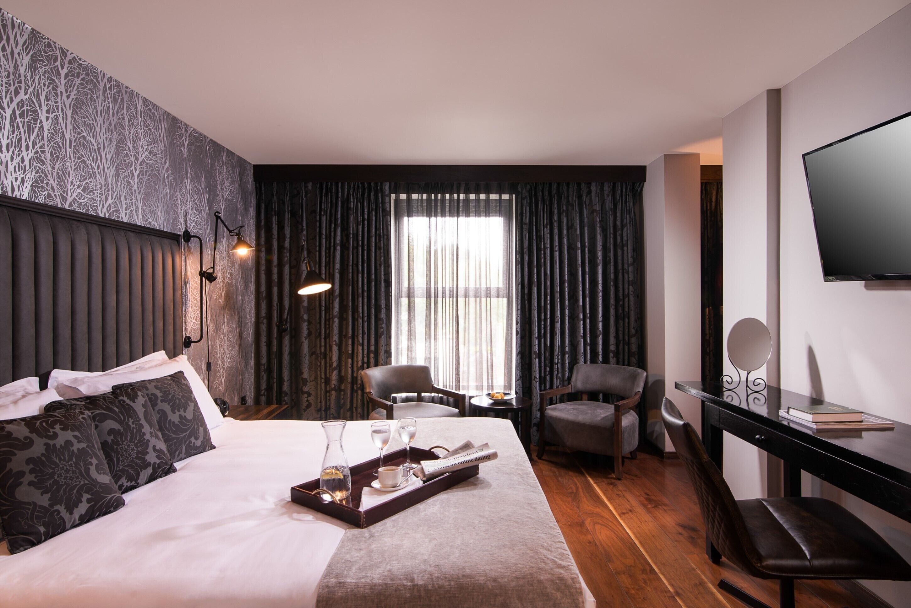 luxury suite, 1 king bed | premium bedding, minibar, in-room safe, individually decorated