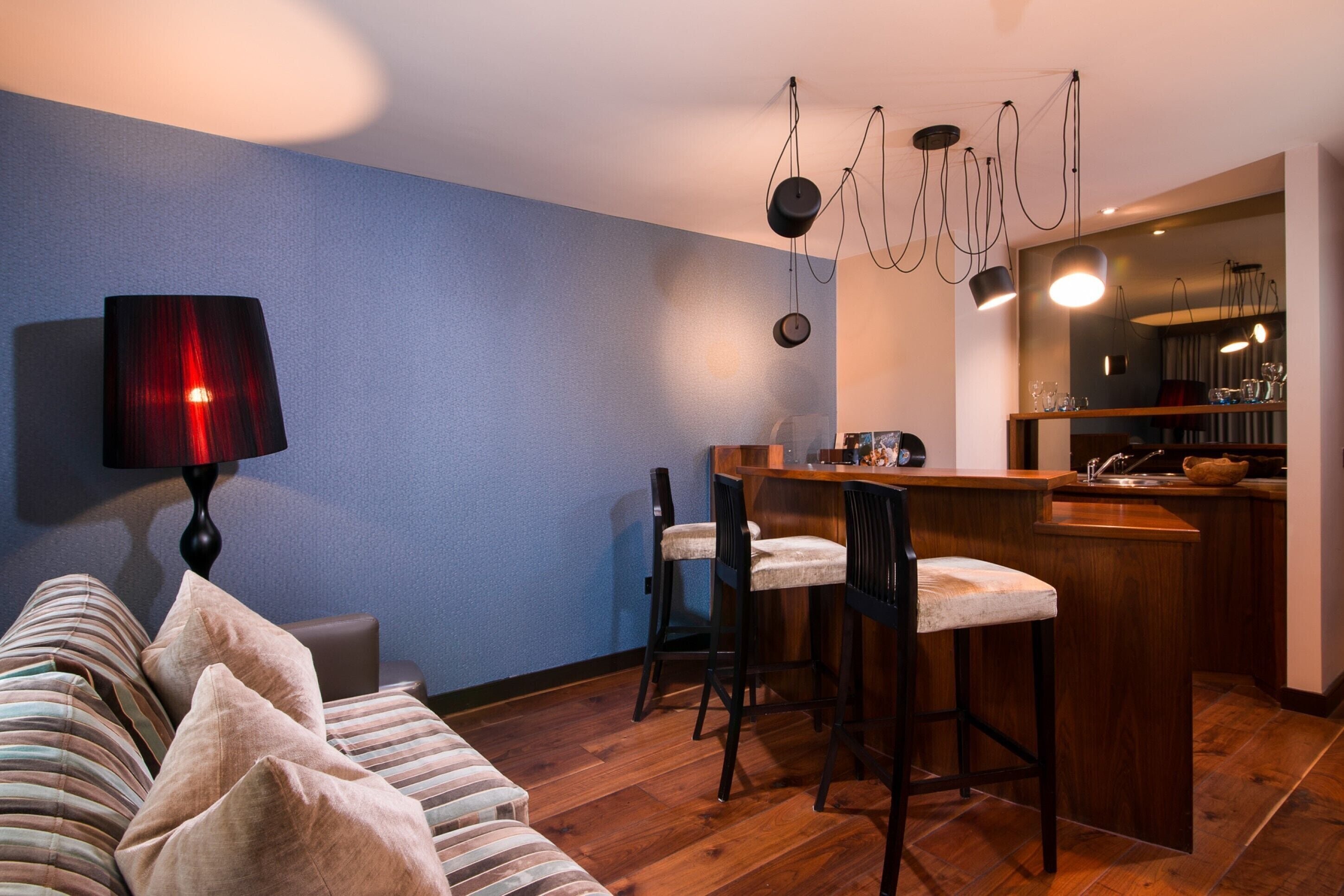 luxury suite, 1 king bed | premium bedding, minibar, in-room safe, individually decorated