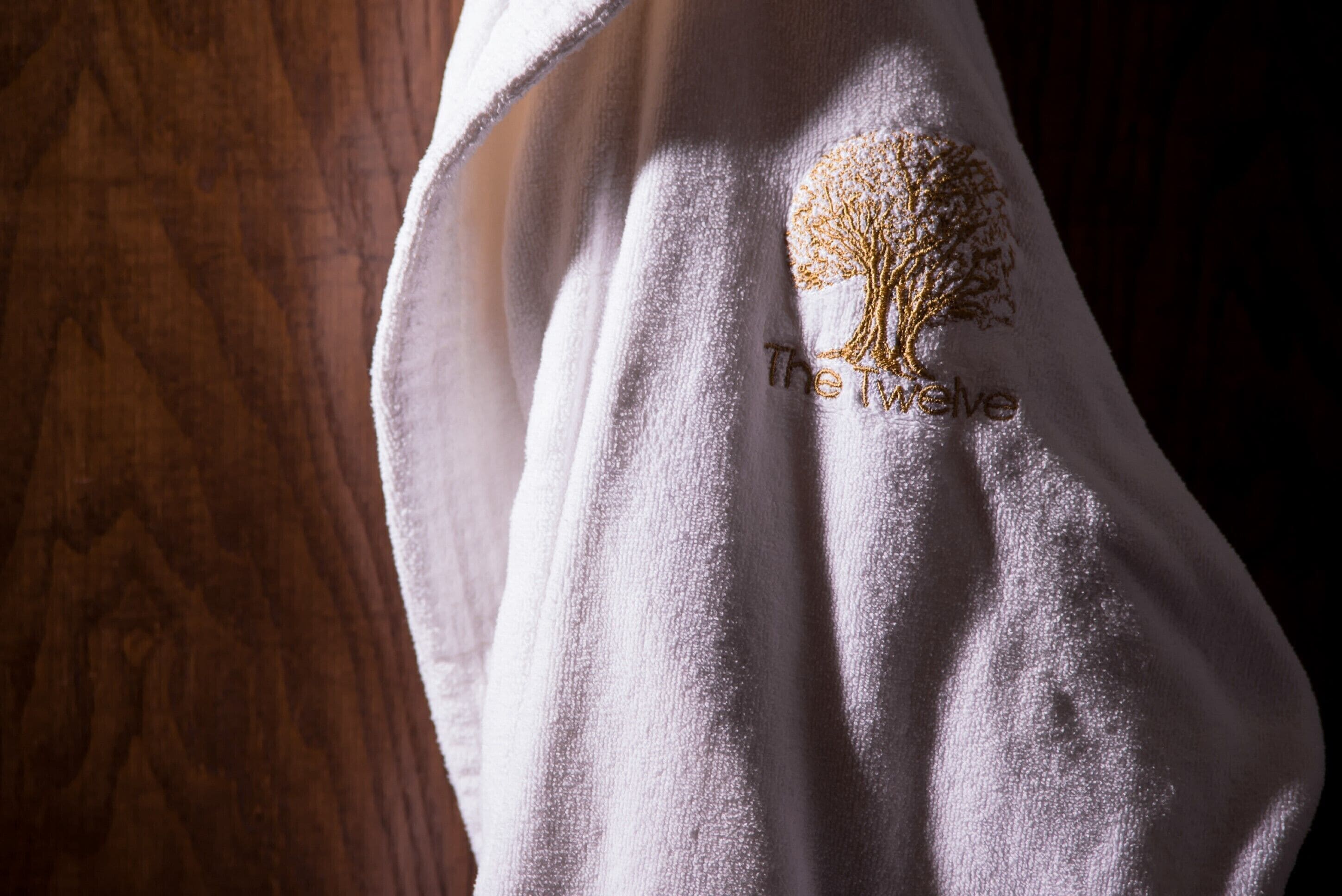 combined shower/bathtub, designer toiletries, hair dryer, bathrobes