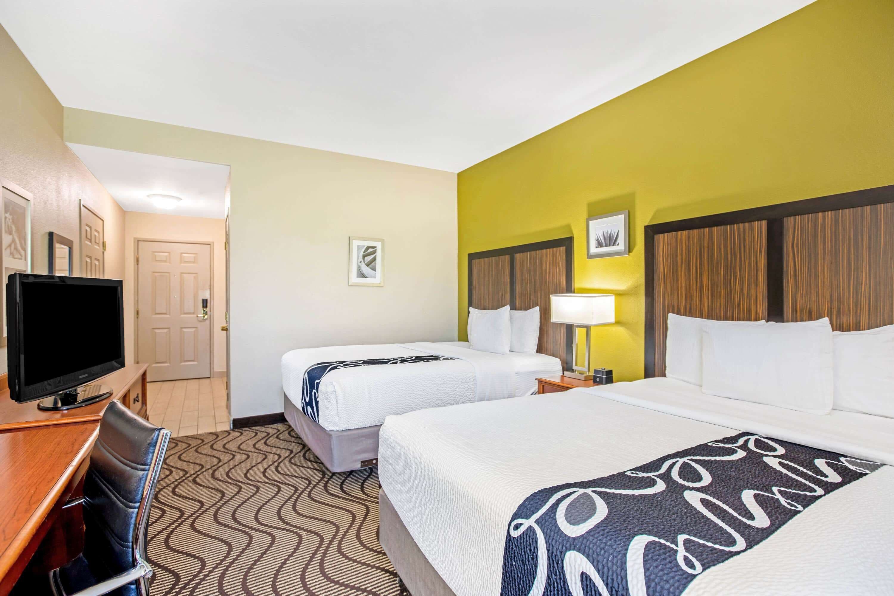 Premium bedding, desk, blackout drapes, iron/ironing board