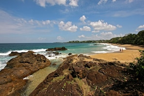 Beach nearby, white sand, beach towels