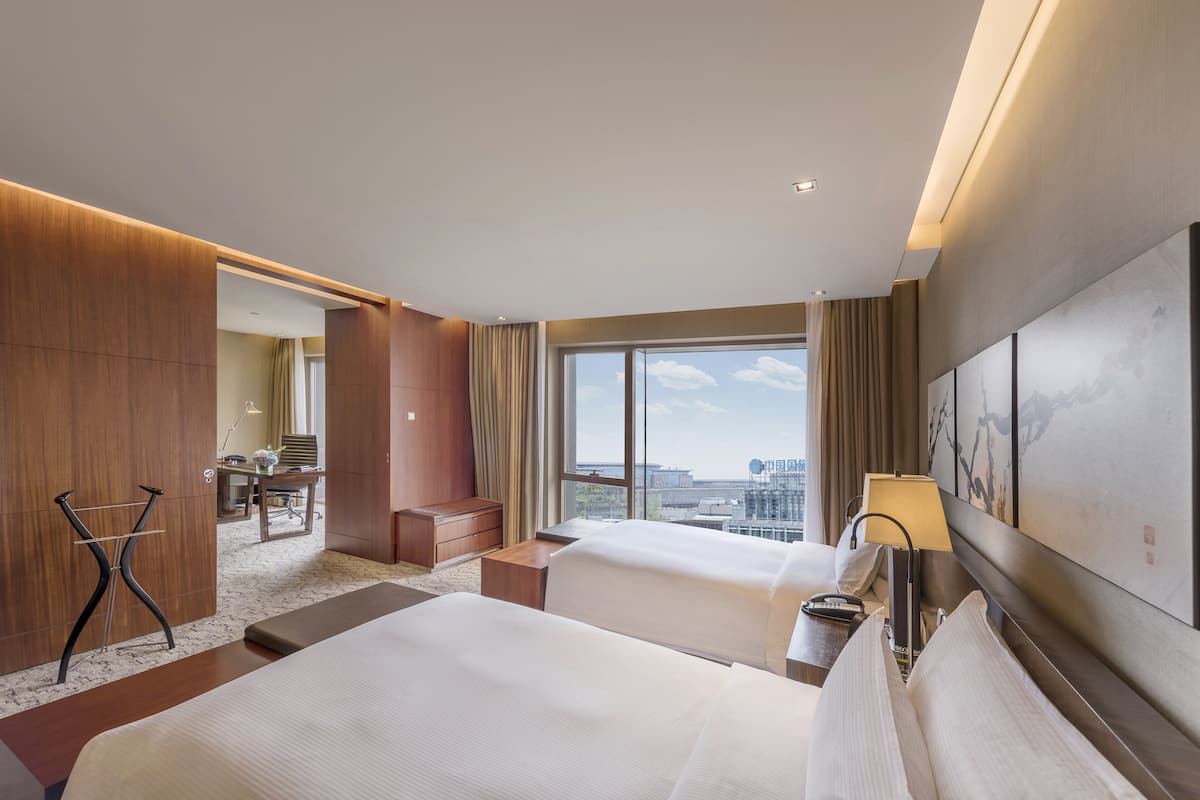 Premium bedding, free minibar items, in-room safe, desk
