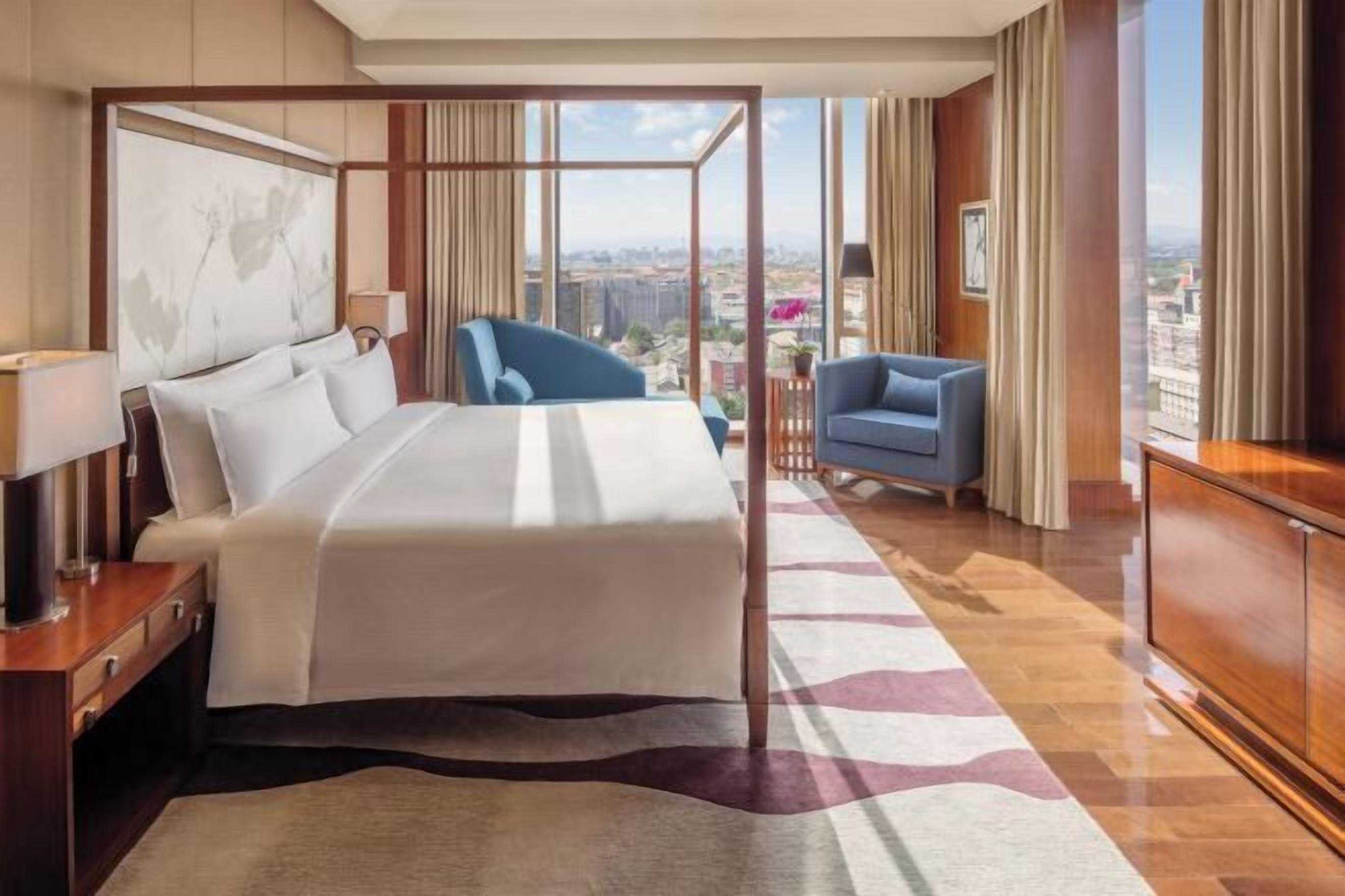 Premium bedding, free minibar items, in-room safe, desk