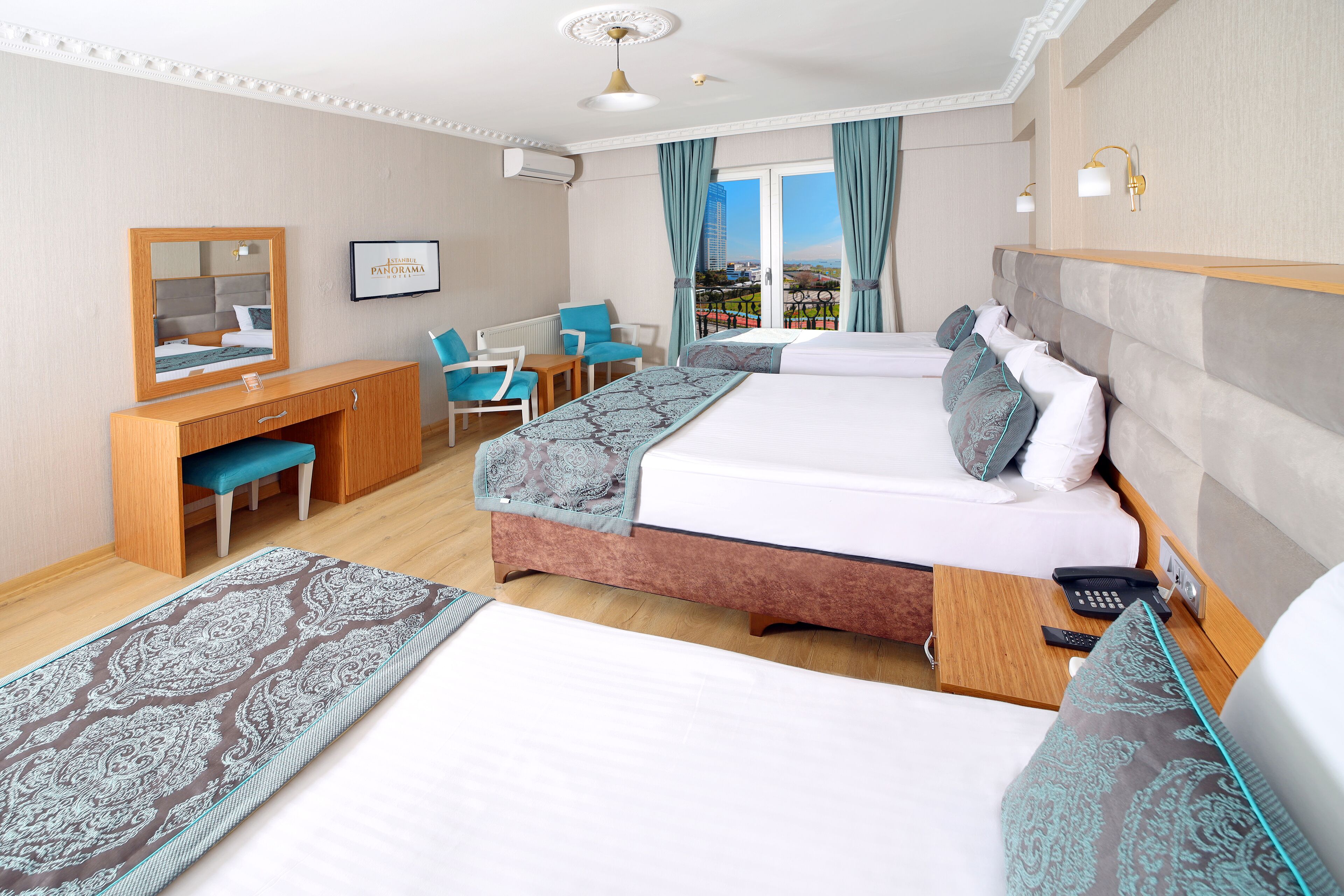 deluxe triple room | premium bedding, minibar, desk, blackout curtains