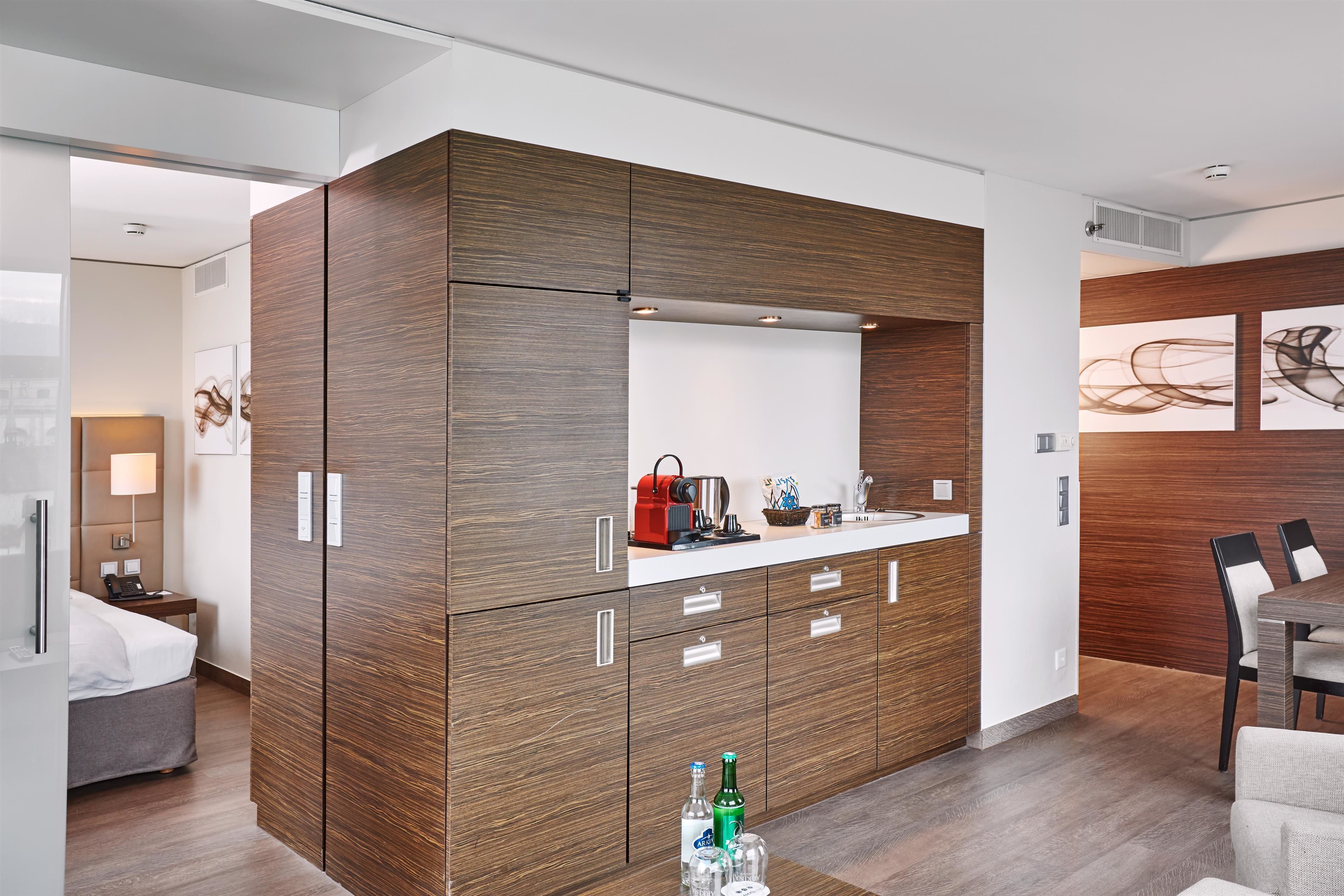 suite | in-room safe, desk, laptop workspace, blackout curtains