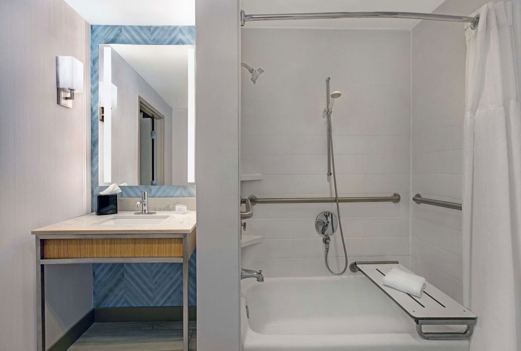 Bathroom | Designer toiletries, hair dryer, towels, shampoo