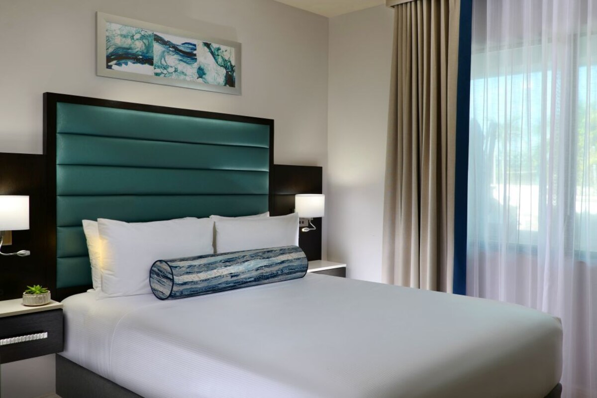 Suite, 2 Bedrooms (Sundeck) | Premium bedding, in-room safe, desk, laptop workspace