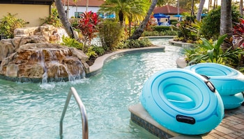 5 outdoor pools, cabanas (surcharge), pool umbrellas at Naples Bay Resort & Marina