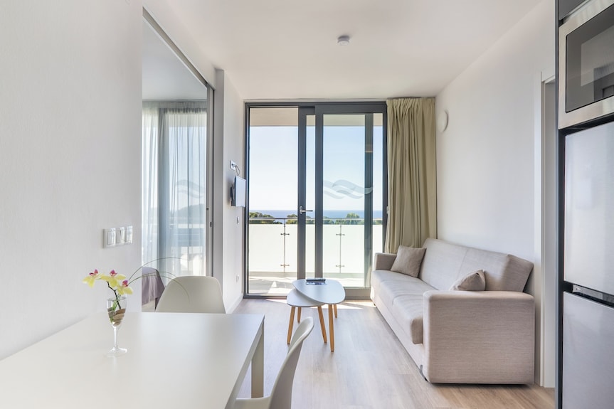 Aparthotel Comtat Sant Jordi Reviews, Deals & Photos 2026 - Expedia Aparthotel Comtat Sant Jordi Reviews, Deals & Photos 2026 - Expedia