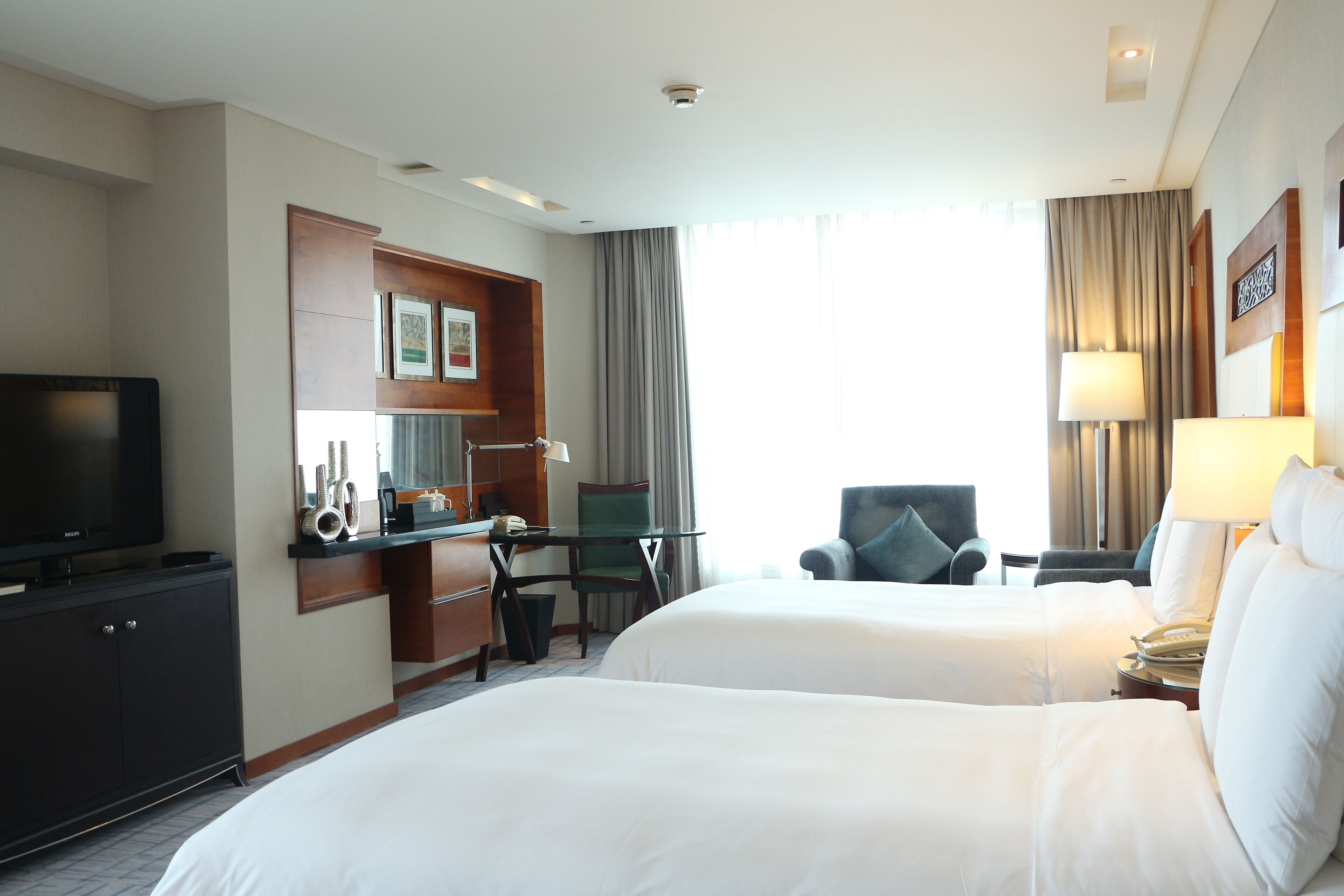 premium bedding, down duvets, minibar, in-room safe