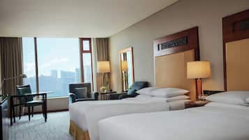 Premium bedding, down comforters, minibar, in-room safe