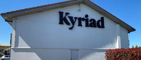 A building with the name 'Kyriad' on its facade.