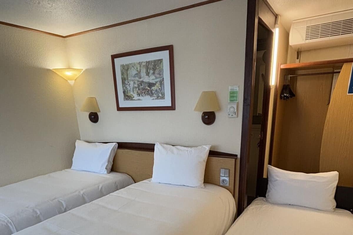 Standard Room - 2 Single Beds 1 Junior Bed up to 10 years | Premium bedding, desk, blackout drapes, iron/ironing board