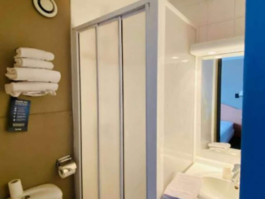 Shower, rainfall showerhead, eco-friendly toiletries, hair dryer